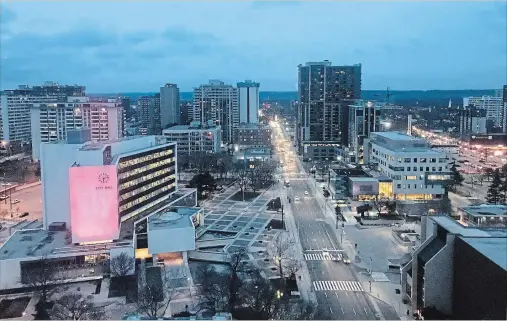  ?? PHOTOGRAPH BY SCOTT GARDNER, THE HAMILTON SPECTATOR ?? The view looking west along Main Street with Hamilton City Hall in the foreground, and Hamilton Place and David Braley Health Sciences Centre across the street.