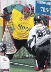  ??  ?? Peterborou­gh Century 21 Lakers goalie Matt Vinc is beaten five hole by Cobourg Kodiaks’ Kyle Killen during first period Major Series Lacrosse action July 19 at the Memorial Centre. Killen has signed a two-year deal to play with the NLL’s Colorado Mammoth.