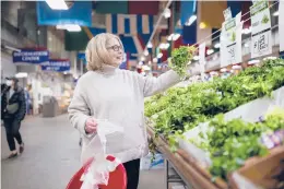  ?? ?? Nunn shops at Your Dekalb Farmers Market in Decatur, Georgia — her favorite spot for produce. The Department of Salad is holding steady as the sixth-most-popular paid food newsletter on Substack, which is home to hundreds of newsletter­s about food and cooking.