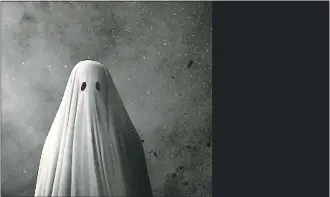  ?? A24 ?? Casey Affleck spends most of the movie as a ghost in David Lowery’s “A Ghost Story.”