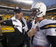  ?? Associated Press ?? Ben Roethlisbe­rger and Philip Rivers have been crossing paths since Draft Day 2004. They meet on the field Sunday for the sixth time. Scouting Report, Page B-2.