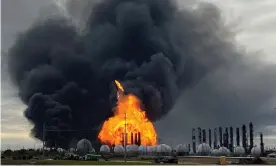  ??  ?? A process tower flies through the air after exploding at a TPC group plant in Port Neches, Texas, on 27 November. Photograph: Erwin Seba/Reuters