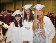  ??  ?? Mary Grace Wiedmann, Eleanor Smith and Emily Madden, Radnor High School Class of 2017 members, pose for a photo.