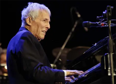  ?? LUCA BRUNO — THE ASSOCIATED PRESS FILE ?? Composer Burt Bacharach performs in Milan, Italy, in July 2011. The Grammy-, Oscar- and Tony-winning Bacharach died of natural causes Wednesday at his home in Los Angeles, publicist Tina Brausam said Thursday. He was 94.