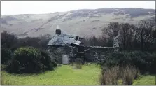  ??  ?? The Lochranza barking house before its partial roof collapsed.