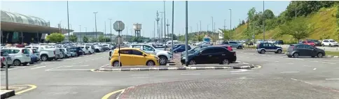  ??  ?? Photo shows designated parking lots for cars at Sibu Airport.