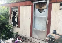  ?? COURTESY OF WSPA-TV ?? An Alberta woman who was allegedly lured to this home in Pickens County, S.C., by a man who restrained and sexually assaulted her escaped by jumping out the window as police arrived on the scene.