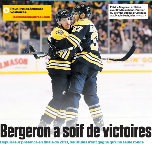  ?? PHOTO AFP ?? Patrice Bergeron a célébré avec Brad Marchand, l’auteur du premier but des Bruins face aux Maple Leafs, hier.