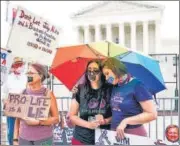  ?? AP ?? Abortion-rights activists outside the Supreme Court on Friday.