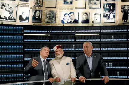  ?? PHOTO: REUTERS ?? Indian Prime Minister Narendra Modi, centre, Israeli Prime Minister Benjamin Netanyahu, right, and Yad Vashem chairman Avner Shalev, at the Hall Of Names at Yad Vashem Holocaust memorial in Jerusalem.