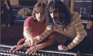  ?? MAGNOLIA PICTURES ?? Producer Kerry Mcnabb (left) is shown with Frank Zappa in a new documentar­y.