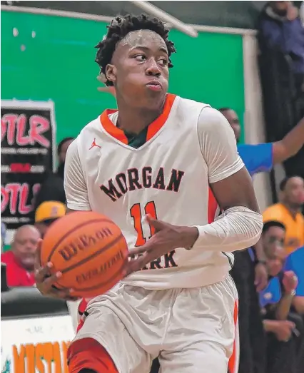  ?? | WORSOM ROBINSON/ FOR THE SUN- TIMES ?? Guard Ayo Dosunmu has missed Morgan Park’s last three games because of an ankle injury.