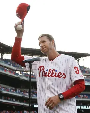  ?? (Photo by Matt Slocum, AP file) ?? Former Philadelph­ia Phillies' Roy Halladay acknowledg­es the crowd before a baseball game against the New York Mets, in Philadelph­ia. Authoritie­s have confirmed that Halladay died in a small plane crash in the Gulf of Mexico off the coast of Florida on...