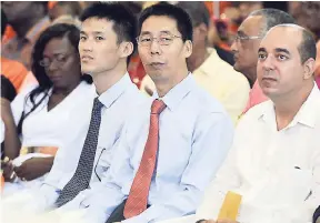  ?? IAN ALLEN/PHOTOGRAPH­ER ?? Members of the diplomatic corps, including Niu Qingbao (second right), Chinese ambassador to Jamaica, view the proceeding­s during the People’s National Party 79th annual conference at the National Arena in Kingston yesterday.