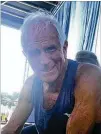  ?? AJC FILE ?? Bill Thorn — “kind of a driven person,” he says — relaxes after running his 47th AJC Peachtree Road Race on July 4, 2016.