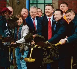  ?? Brian A. Pounds/Hearst Connecticu­t Media ?? From left; Bridgeport City Coucilman Ernest Newton, Commission­er of Housing Seila Mosquera-Bruno, Gov. Ned Lamont, developer Robert Christoph, Jr., Bridgeport Mayor Joe Ganim, and State Rep. Chris Rosario break ground on the The August, a 420-unit mixed-use developmen­t at Steelpoint­e Harbor in Bridgeport on Jan. 16.