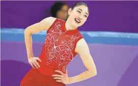  ?? JULIE JACOBSON/ASSOCIATED PRESS ?? Mirai Nagasu reacts after her performanc­e during the team figure skating final. She became the first American woman, and third overall, to land a triple axel in the Olympics.