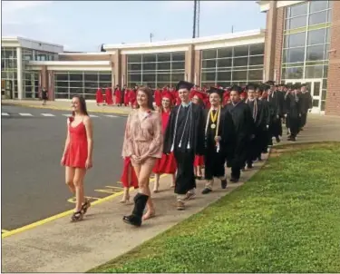  ?? PHOTOS BY JEFF MILL — HEARST CONNECTICU­T MEDIA ?? Portland High School graduated 97 students on Thursday evening.