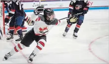  ?? GRETCHEN ERTL NYT ?? Hamilton’s Laura Fortino scores against the United States for Canada during a game in Boston on Oct. 25, 2017.