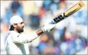  ??  ?? Murali Vijay celebrates after scoring a century during the second day of the second Test against Sri Lanka at the VCA Stadium in Nagpur on Saturday.