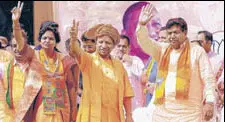  ?? KESHAV SINGH/HT ?? Uttar Pradesh chief minister Yogi Adityanath (centre), BJP MLA Gian Chand Gupta (right) and party candidate Latika Sharma at a rally in Kalka on Friday.