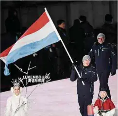  ?? Foto: AFP ?? Als einziger Luxemburge­r Sportler bei den Spielen 2018 in Pyeonchang hatte Matthieu Osch die Ehre, Fahnenträg­er zu sein.