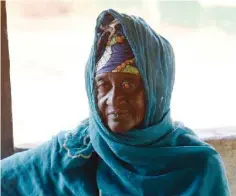  ??  ?? A photo taken on April 8, 2017 shows Mariama Fofana, believed to be an eighth-generation descendent of Kunta Kinte, sits in her home in Juffureh, a village close to the island of Kunta Kinteh.