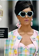  ?? ?? Sunglasses and acrylic earrings, Moschino