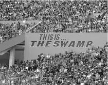  ?? AP PHOTO ?? Attendance at the Swamp was limited to 20% capacity during the 2020 season due to the COVID-19 pandemic, but UF athletic director Scott Stricklin said he anticipate­s allowing full capacity at Florida Gators games during the 2021 season.