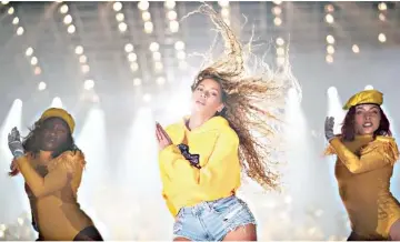  ??  ?? Beyoncé made Coachella-history in 2018, becoming the first woman of colour to headline the music festival. On Sunday, Netflix tweeted out an announceme­nt that a Beyoncé-related project would be coming to the streaming platform on April 17.The documentar­y 'Homecoming' chronicles the singer's highly-praised performanc­e at Coachella — which was officially dubbed "Beychela" — last year. • (Below) Beyonce performed at the Coachella festival last year. — Relaxnews photo