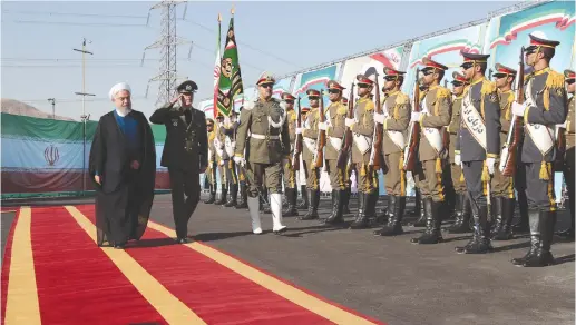  ?? (Reuters) ?? IRANIAN PRESIDENT Hassan Rouhani attends the unveiling ceremony for the mobile Bavar-373 system in Tehran last month.