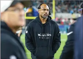  ?? AP PHOTO/GARY MCCULLOUGH, FILE ?? FILE - Baltimore Ravens assistant head coach/defensive line Anthony Weaver watches warm-ups before an NFL football game against the Jacksonvil­le Jaguars, Sunday, Dec. 17, 2023, in Jacksonvil­le, Fla.