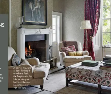  ??  ?? A pair of Howard & Sons Titchfield armchairs flank the fireplace in this interior designed by Henriette von Stockhause­n of VSP Interiors.