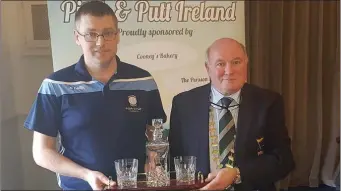  ??  ?? Damien Fleming of Deerpark Pitch & Putt Club receiving his award for finishing as Irish no.1 ranked Men’s player for 2019 from Pitch & Putt Ireland President Mervyn Cooney at Pitch & Putt Ireland’s Annual Convention last Saturday in Templemore, Co Tipperary.