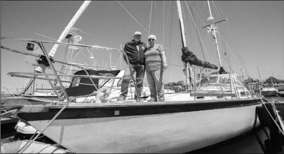  ?? Ted and Patricia Haight on board Xcelsior II, a 44-foot sailboat at the Dartmouth Yacht Club. ERIC WYNNE/CHRONICLE HERALD ??