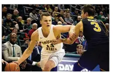  ?? CONTRIBUTE­D BY ALLISON RODRIGUEZ ?? Wright State senior guardGrant Benzinger made a 3-pointer with 11 seconds left Saturday to pull the Raiders to within one, but missed another 3-pointer at the buzzer.