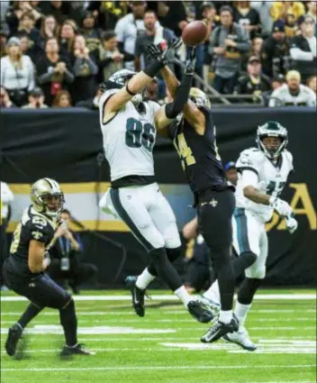  ?? SCOTT CLAUSE — THE DAILY ADVERTISER VIA AP ?? Saints safety Vonn Bell tries to break up a pass intended for Eagles tight end Zach Ertz in the NFC divisional playoff game Sunday in New Orleans. New Orleans won, 20-14.