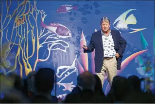  ?? PHOTOS BY RICHARD GRAULICH / THE PALM BEACH POST ?? Artist and scientist Guy Harvey discusses his travels and conservati­on efforts Wednesday at Palm Beach State College’s STEAM fundraiser at the Kravis Center. “We try to talk about the dollar value. It’s the only way (policymake­rs) understand what needs...