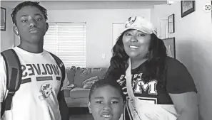  ?? PROVIDED BY FAMILY ?? Brittney Harris with her two sons, Darius, 14, left, and Brannon, 6. Harris’ sons were among four people injured and her mother, 66-year-old Debra Harris, died following a two-vehicle traffic crash Friday afternoon at Polaris Parkway and North Cleveland Avenue in Westervill­e.