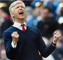  ?? — Reuters ?? Untold joy: Manager Arsene Wenger pumping his fists in delight after Arsenal’s 2-1 win over Manchester City in the English FA Cup semi-final at Wembley on Sunday.