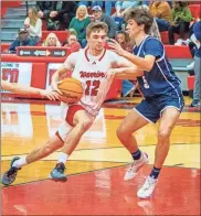  ?? Charlie Qualls, Warriors In Motion Photograph­y ?? LFO’S Brent Bowman drives in the lane against Gordon Lee’s Will Mccutcheon during Friday’s Region 6- AAA game at LFO. The senior had 37 points and became the all-time leading scorer in the history of the school’s boys’ program.