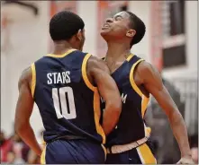  ?? KYLE FRANKO — TRENTONIAN PHOTO ?? Nottingham’s Trey Kauffman, left, celebrates with teammate Nazir Collins, right, after scoring a basket against Hamilton West during Saturday’s CVC game.