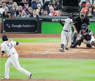  ?? LYNNE SLADKY/AP ?? Boston Red Sox outfielder Jackie Bradley Jr. admires his grand slam off Houston Astros reliever Roberto Osuna on Tuesday during Boston’s Game 3 American League Championsh­ip Series victory in Houston.