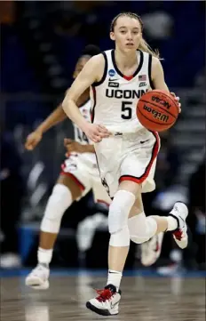  ?? Elsa/Getty Images ?? Paige Bueckers averages 19.8 points and 6.2 assists.