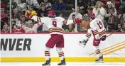  ?? ABBIE PARR / AP ?? Boston College forward Cutter Gauthier (19) celebrates after scoring against Michigan during the second period of a Frozen Four semifinal Thursday.