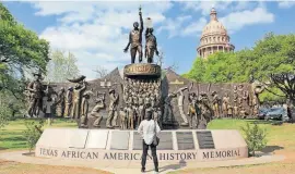  ?? JUSTRAVELI­NG.COM/WIKIPEDIA ?? The Texas African American History Memorial in Austin.