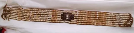  ?? HAMILTON SPECTATOR FILE PHOTO ?? Below: A piece of wampum, a traditiona­l shell bead used for storytelli­ng and gift-giving. Such belts were used to record important events such as the Two Row Wampum Treaty. The wampum pictured is one of five pieces returned to Six Nations by the Royal...