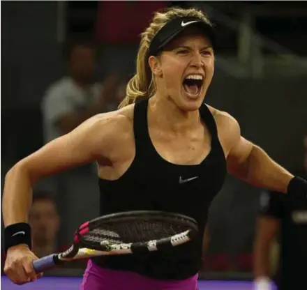  ?? PIC ?? Eugenie Bouchard celebrates winning the match against Maria Sharapova in the Madrid Open on Monday.REUTERS