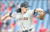  ?? LAURENCE KESTERSON – THE ASSOCIATED PRESS ?? Giants starting pitcher Jeff Samardzija allowed five runs in four innings Monday in an 11-0 loss to Philadelph­ia.