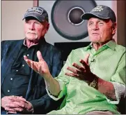  ?? KIRSTY WIGGLESWOR­TH/AP PHOTO ?? Beach Boys musicians Mike Love, left, and Bruce Johnston, right, during an interview with Associated Press at Spiritland in London.